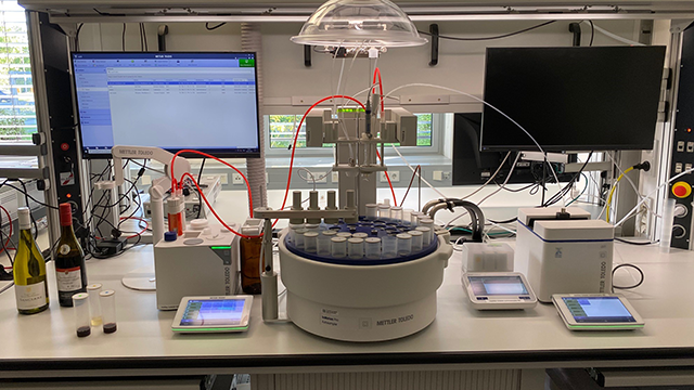 Figure 2. The photoacoustic setup integrates an autosampler, UV/Vis spectrophotometer, and pH meter. Figure 2. The photoacoustic setup integrates an autosampler, UV/Vis spectrophotometer, and pH meter.