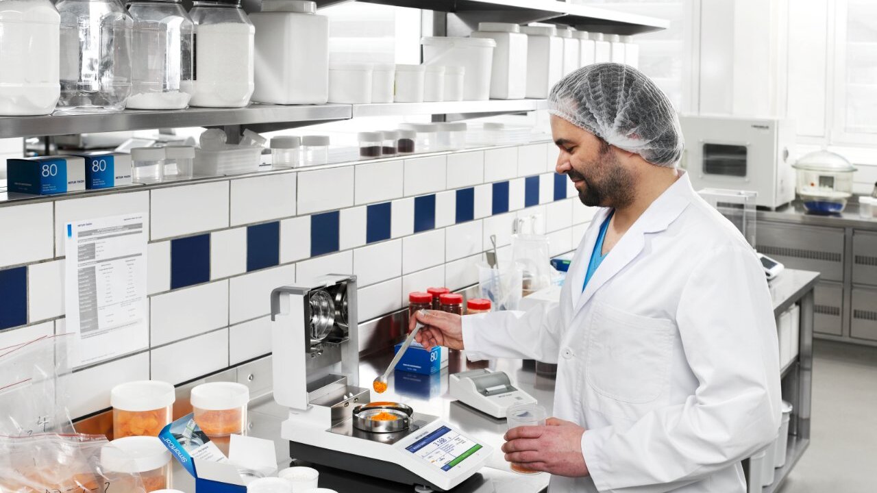 Scientist using a moisture analyser