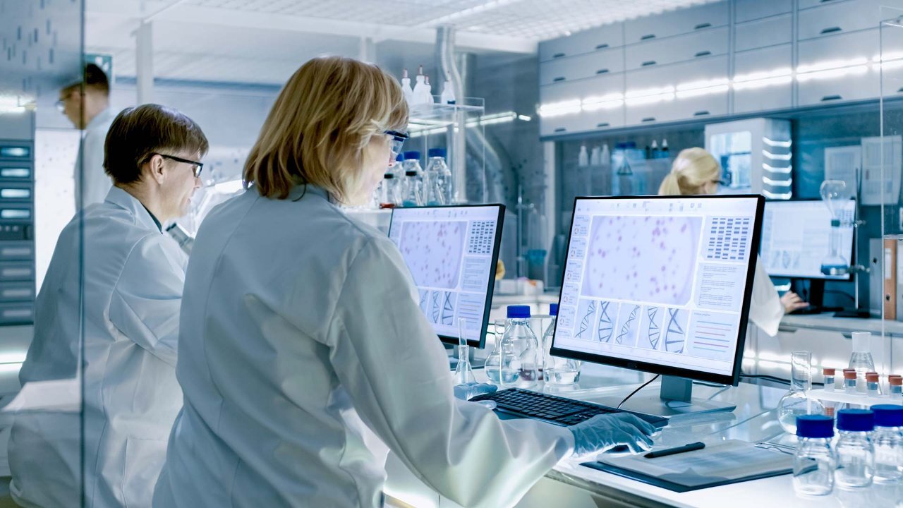 scientists working on computers