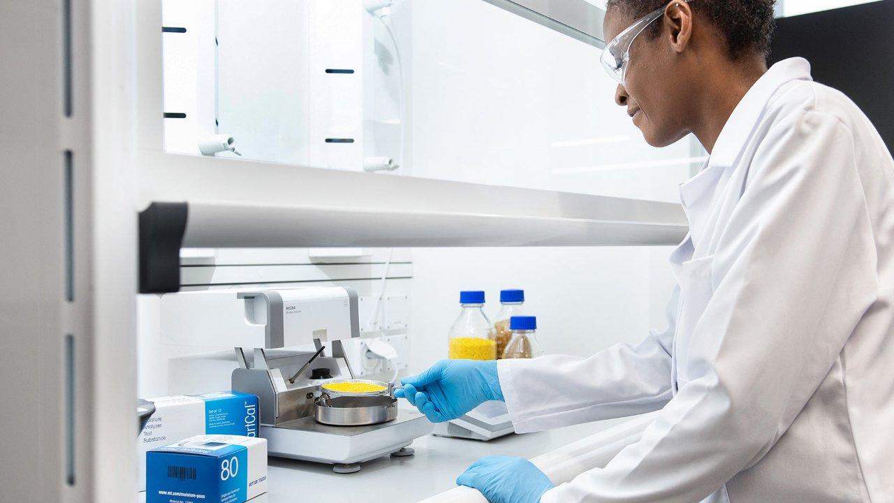 female scientist working in a lab