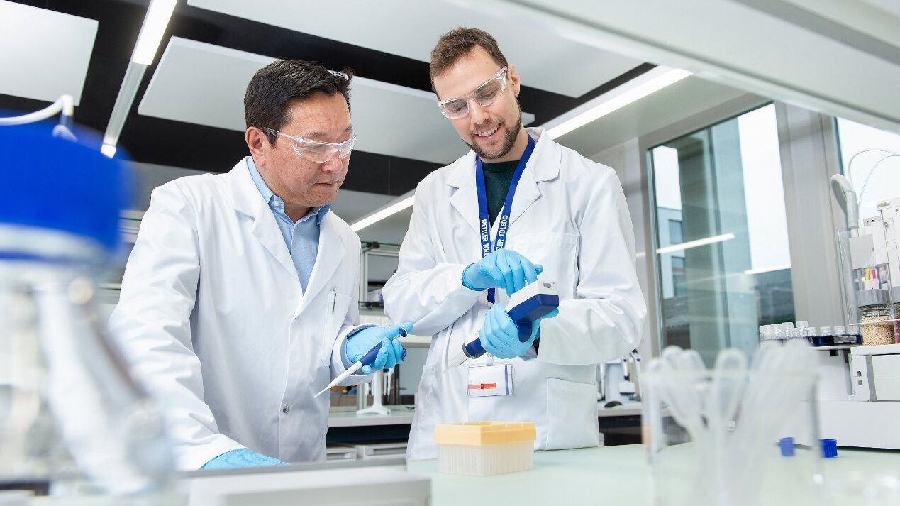 Scientists working in lab environment