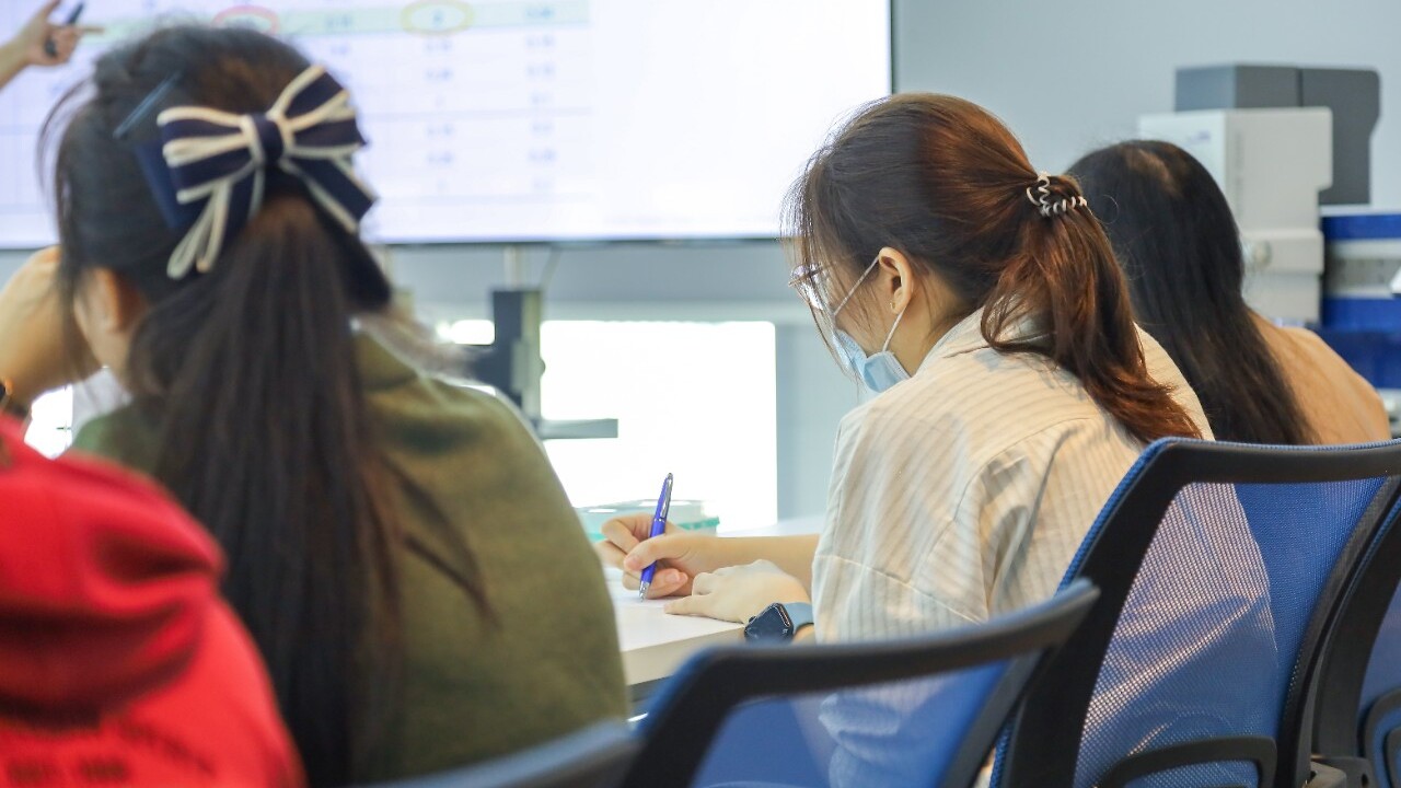 pipetting technique instructor running a seminar