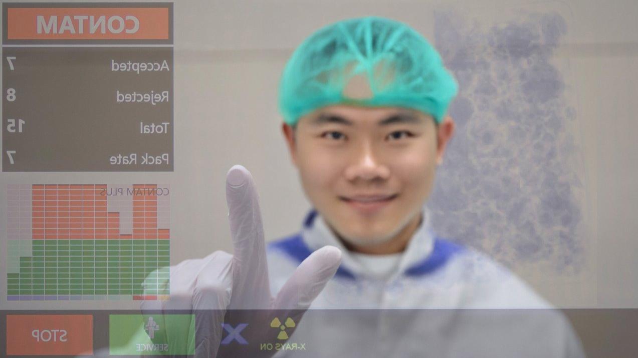 Image of man using x-ray inspection system